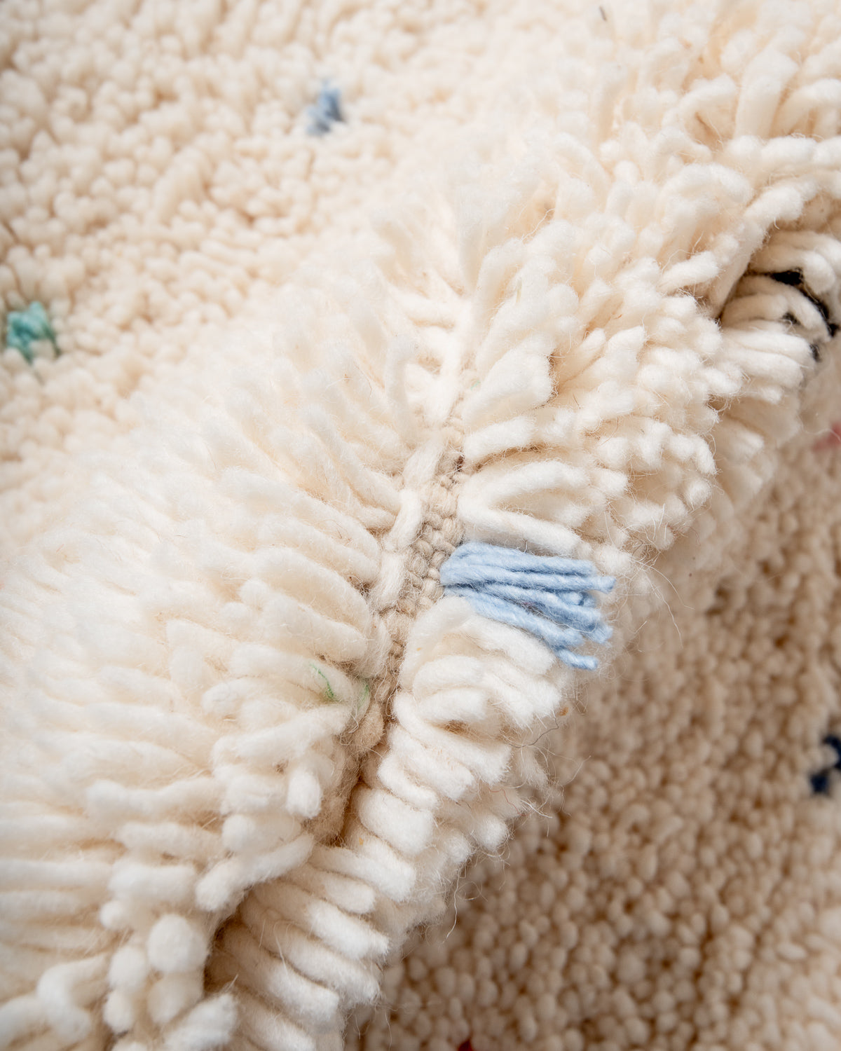 Modern, designer, handcrafted Berber rug from Morocco. Beniourain carpet with beautiful colours and patterns and fluffy wool texture.